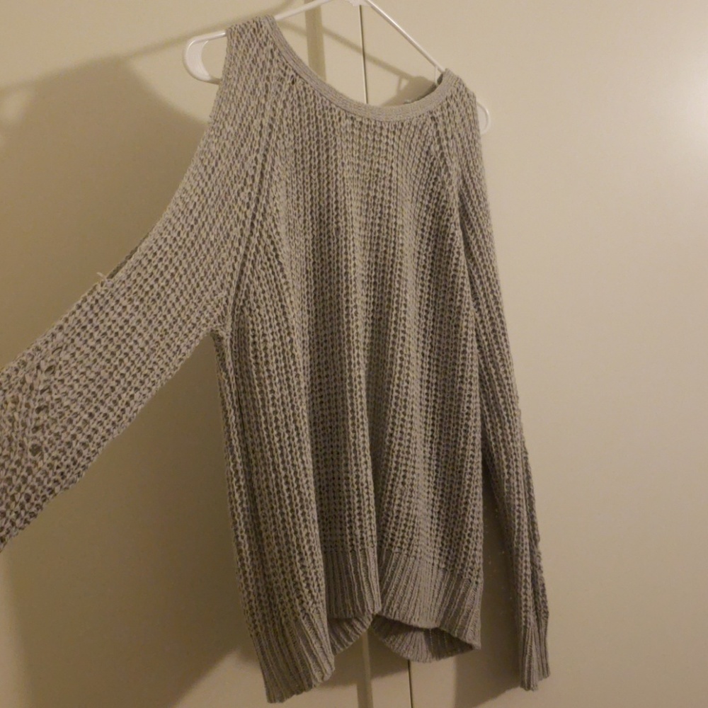 Beautiful knit sweater with open back